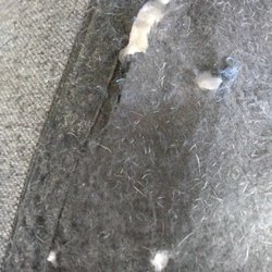 Costless Warehouse - The back of the cushion fabric is so thin when you grab the pillows, the fabric tears. This one is tearing at the seam.