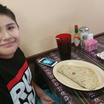 Los Cabos - My lil one enjoying his bacon, egg,&bean taco. - Seafood Near Me - Port Isabel, Texas