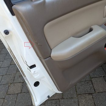 Interior Renovations - Driver side door puncture - Auto Upholstery Near Me - Kirkland, Washington