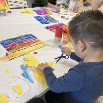 Kidcreate Studio - Waiting for art to try and learning to trace and cut - Art Classes Near Me - Dana Point, California