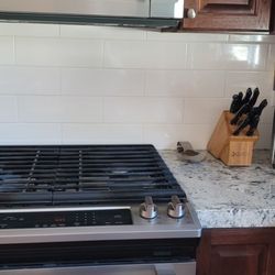 Sundance Tile and Marble - Portion of Kitchen backsplash (done in 2017)