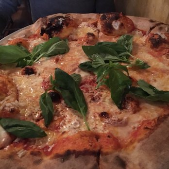 Lucali - Large pie with basil - Pizza Near Me - Brooklyn, New York Lucali - Large pie with basil - Pizza Near Me - Brooklyn, New York