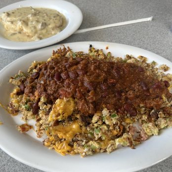 Schooner or Later - The mess topped with chili and a side of biscuits and gravy. - Sandwiches Near Me - Long Beach, California Schooner or Later - The mess topped with chili and a side of biscuits and gravy. - Sandwiches Near Me - Long Beach, California