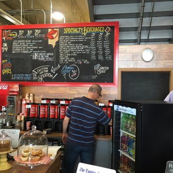 The Little Red Roaster - a man standing at the counter - Coffee & Tea Near Me - London, Ontario The Little Red Roaster - a man standing at the counter - Coffee & Tea Near Me - London, Ontario