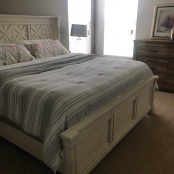 Ashley Store - Our first floor guest bedroom suite. - Furniture Stores Near Me - Buford, Georgia