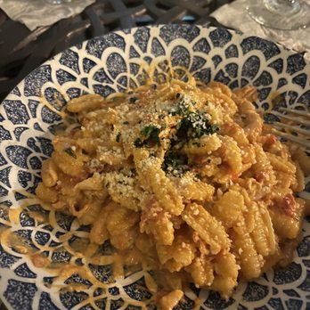 Grappino - Cavetelli pasta with Polletto and Vodka Sauce - Italian Near Me - Naples, Florida Grappino - Cavetelli pasta with Polletto and Vodka Sauce - Italian Near Me - Naples, Florida
