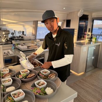 MANA Cruises & Charters - First mate Masa preparing our gourmet dishes - Boat Tours Near Me - Kapolei, Hawaii MANA Cruises & Charters - First mate Masa preparing our gourmet dishes - Boat Tours Near Me - Kapolei, Hawaii