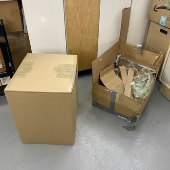 1HomeOffice - The  BEFORE + AFTER My terrible packing on the right. Their incredible job on the left. - Mailbox Centers Near Me - New York, New York