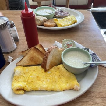 Bruen's Restaurant - Eggs with cheese, toast, grits.. my hubs is eggs, hash brown, biscuits & gravy, and fried pork chop. - American Near Me - Stanton, Kentucky
