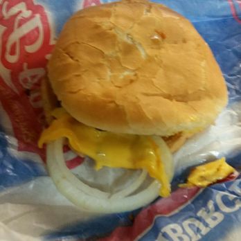 Carl's Jr - Onions rings popping out of my burger. Damn. Just don't add onions next time if this is how you serve - Fast Food Near Me - Montebello, California