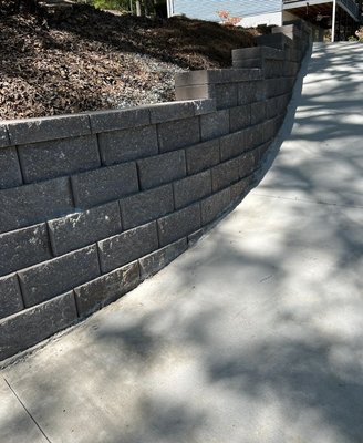 Elevating Landscapes with Expert Retaining Walls - Transform the contours of your outdoor space with Chalk Line Design and Construction's expertly crafted retaining walls. Our skilled team, armed with years of industry expertise, specializes in creating not just functional but aesthetically pleasing retaining walls that enhance the beauty and stability of your landscape. Whether you're looking for a natural stone appearance, a modern design, or a custom solution tailored to your vision, our artisans bring creativity and precision to every project. Chalk Line's commitment to quality ensures that your retaining walls not only serve their purpose but become a focal point of your outdoor aesthetic. Ready to redefine your landscape? Contact us today, and let's discuss how our meticulous craftsmanship can elevate your surroundings with expertly designed retaining walls! Elevating Landscapes with Expert Retaining Walls - Transform the contours of your outdoor space with Chalk Line Design and Construction's expertly crafted retaining walls. Our skilled team, armed with years of industry expertise, specializes in creating not just functional but aesthetically pleasing retaining walls that enhance the beauty and stability of your landscape. Whether you're looking for a natural stone appearance, a modern design, or a custom solution tailored to your vision, our artisans bring creativity and precision to every project. Chalk Line's commitment to quality ensures that your retaining walls not only serve their purpose but become a focal point of your outdoor aesthetic. Ready to redefine your landscape? Contact us today, and let's discuss how our meticulous craftsmanship can elevate your surroundings with expertly designed retaining walls!