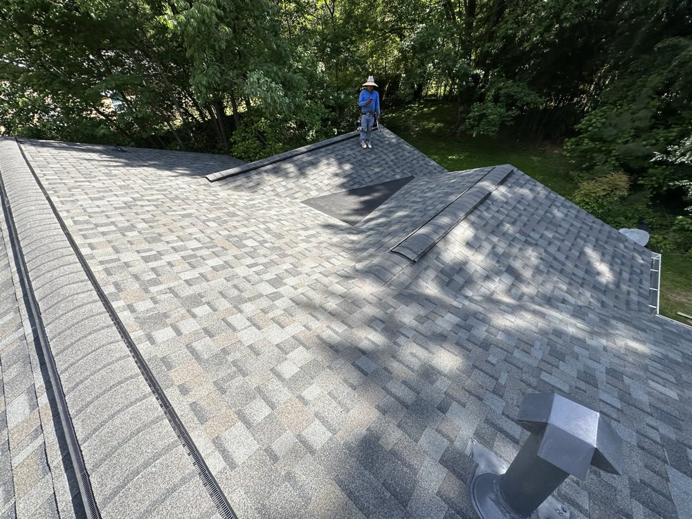 Slide of Reel Roofing and Construction