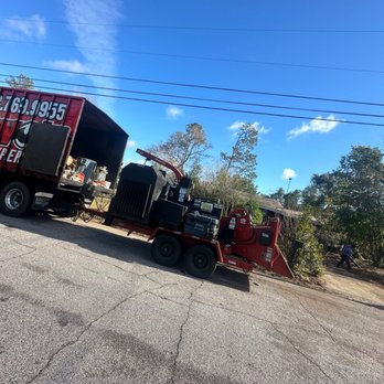 Rhino Tree Experts - One of our chip trucks with a chipper - Tree Services Near Me - Augusta, Georgia Rhino Tree Experts - One of our chip trucks with a chipper - Tree Services Near Me - Augusta, Georgia