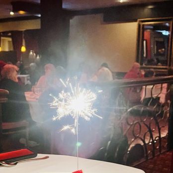 Russell's Steaks Chops & More - Birthday sparkler! - Steakhouses Near Me - Williamsville, New York Russell's Steaks Chops & More - Birthday sparkler! - Steakhouses Near Me - Williamsville, New York