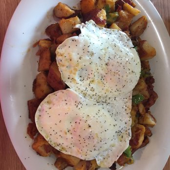 Eggs Up Grill - Loaded home fried potatoes platter with 2 fried eggs on top! - Breakfast & Brunch Near Me - Rock Hill, South Carolina Eggs Up Grill - Loaded home fried potatoes platter with 2 fried eggs on top! - Breakfast & Brunch Near Me - Rock Hill, South Carolina