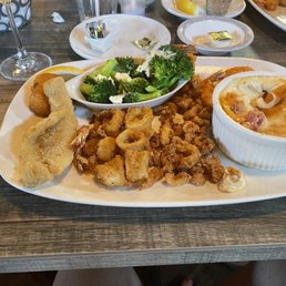 Twice baked potatoes, calamari, clam strips, fried white fish, shrimp, scallops, broccoli.
