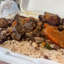Stew beef lunch special double order of rice and plantain