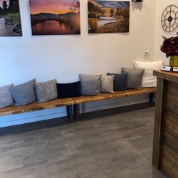 River City Hair Studio - Waiting area with photos of Missoula