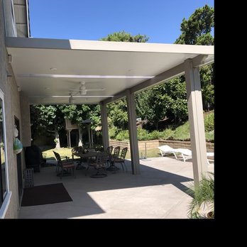 Rollins Construction - Four Seasons Elitewood Ultra patio cover with 6 recessed lights, 2 ceiling fans, and 2 IllumaView Skylights - Patio Coverings Near Me - Upland, California