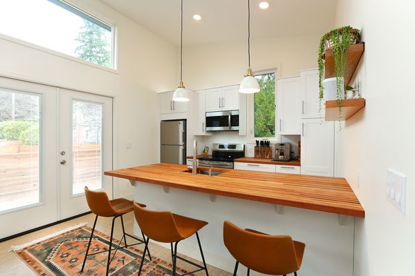 Photo of Greenhome Solutions - Seattle, WA, US. Madrone Butcher Block Countertop + Wicanders Cork Flooring - Shoreline, WA DADU by Targa Homes