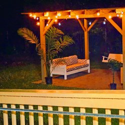 Caring Angels Senior Care - The pergola at night, residents enjoy listening to thier favorite music or just listening to nature, it's a soothing. place to relax..