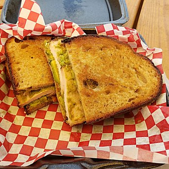 JNL Barbecue - Smoked turkey, house cured and smoked bacon, and guacamole sandwich - Barbeque Near Me - Austin, Texas JNL Barbecue - Smoked turkey, house cured and smoked bacon, and guacamole sandwich - Barbeque Near Me - Austin, Texas