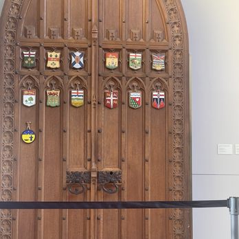 Senate of Canada Building - Door with coat of arms of all 13 provinces and territories - Public Services & Government Near Me - Ottawa, Ontario