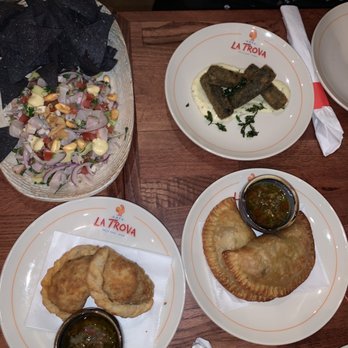Cafe La Trova - Hand Cut Steak Empanada Sweet Corn & Chicken Empanada Seafood Ceviche Roast Calabaza Empanada - Cocktail Bars Near Me - Miami, Florida