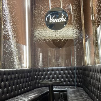 Venchi - Love that they have the chocolate waterfall wall! - Chocolatiers & Shops Near Me - New York, New York
