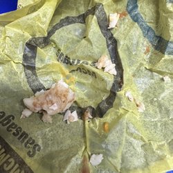 McDonald's - Pieces of egg shells in my Sausage & Egg McMuffin