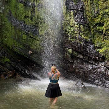 Cash’s Tropical Treks - Cash took this picture of me taking a picture at the waterfalls - Tours Near Me