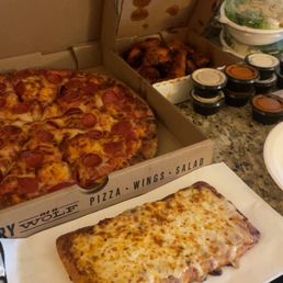 Family meal: Large Peperoni pizza, Cesar salad, 12 wings, cheese bread and a 2liter soda Family meal: Large Peperoni pizza, Cesar salad, 12 wings, cheese bread and a 2liter soda