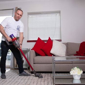 First Choice Cleaning Company - Sergio is vacuuming the living room - Home Cleaning Near Me - San Diego, California First Choice Cleaning Company - Sergio is vacuuming the living room - Home Cleaning Near Me - San Diego, California