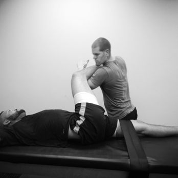 Stretch Therapy - Working with a baseball player before a game - Trainers Near Me - Scottsdale, Arizona Stretch Therapy - Working with a baseball player before a game - Trainers Near Me - Scottsdale, Arizona