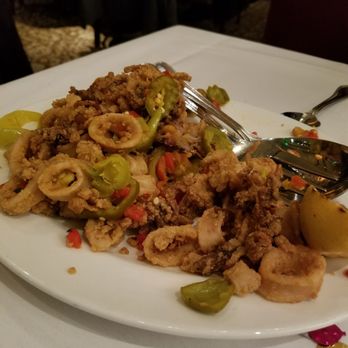The Capital Grille - Pan-fried Calamari with cherry peppers - Steakhouses Near Me - Plano, Texas The Capital Grille - Pan-fried Calamari with cherry peppers - Steakhouses Near Me - Plano, Texas