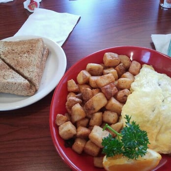Skillets Cafe - Triple meat omelette- inside was stuffed with bacon, ham, and sausage - Breakfast & Brunch Near Me - Windsor, California Skillets Cafe - Triple meat omelette- inside was stuffed with bacon, ham, and sausage - Breakfast & Brunch Near Me - Windsor, California