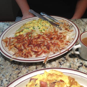 Madison Restaurant - This feta and spinach omelette was massive, the cup of coffee (weak) is in the frame for scale. - American Near Me - New York, New York