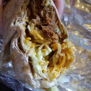 El Diablo - a hand holding a burrito - Mexican Near Me - Missoula, Montana El Diablo - a hand holding a burrito - Mexican Near Me - Missoula, Montana