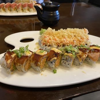 Pisces Sushi - Delicious sushi and great presentation. Top is the Dynamite roll and bottom is the hurricane roll. Both very good - Sushi Bars Near Me - Charlotte, North Carolina Pisces Sushi - Delicious sushi and great presentation. Top is the Dynamite roll and bottom is the hurricane roll. Both very good - Sushi Bars Near Me - Charlotte, North Carolina