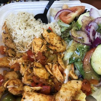 Rafi’s Food Hub - Tikka chicken plate. Includes Pita, Greek salad and seasoned rice. - Mediterranean Near Me - Olean, New York Rafi’s Food Hub - Tikka chicken plate. Includes Pita, Greek salad and seasoned rice. - Mediterranean Near Me - Olean, New York