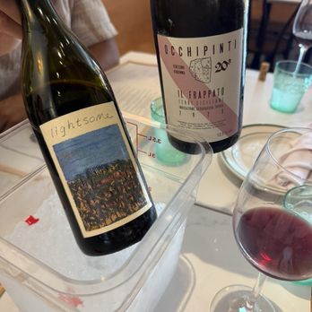 Prometheus Pizza - Excellent wine selection. Chris brought us options, and we chose a Texas red blend and a fun Sicilian for our group. - Pizza Near Me - Fredericksburg, Texas