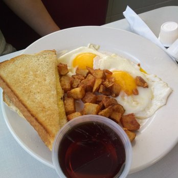 Oasis Diner - Home fries and toast with Sunnyside up eggs and maple syrup. - Diners Near Me - Plainfield, Indiana