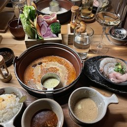 Shrimp, Miso Smokey broth, all dipping sauces. Queso in the bowl was awesome Shrimp, Miso Smokey broth, all dipping sauces. Queso in the bowl was awesome