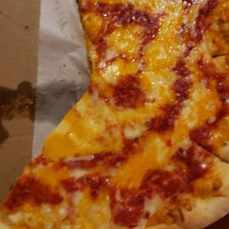 Greezy pizza, with some sort of cheddar motz cheese blend
