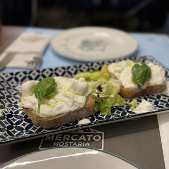 Mercato Hostaria - bruschetta with mozzarella di bufalo and basil - Pizza Near Me - Rome, RM Mercato Hostaria - bruschetta with mozzarella di bufalo and basil - Pizza Near Me - Rome, RM