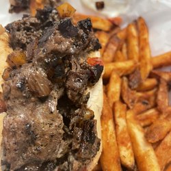 Jimmies Place - Cheesesteak grinder and seasoned fries!