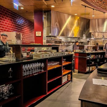 Mercat a la Planxa - The open kitchen with gorgeous red tile. - Tapas Bars Near Me - Chicago, Illinois