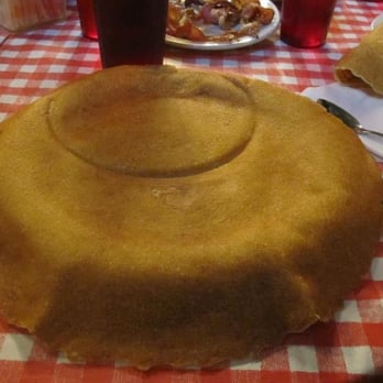 Billy Gail's - Indentation from another plate that was on top of my pancake when it was served to me.  It was dry and bacon was not cooked! - American Near Me - Branson, Missouri