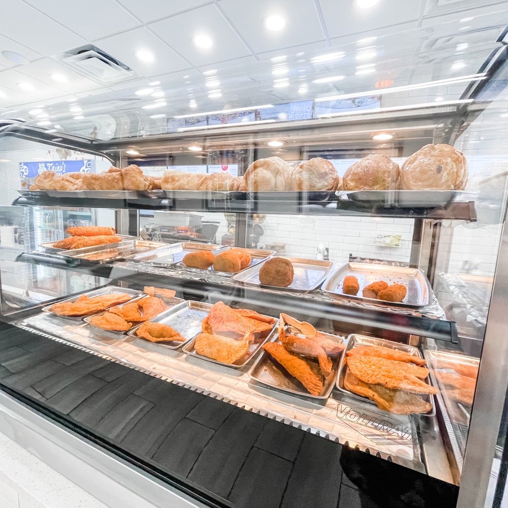 Taino's Bakery & Deli - Hot savories like rellenos (potato stuffed varieties) and empanadas. - Bakeries Near Me - Orlando, Florida Taino's Bakery & Deli - Hot savories like rellenos (potato stuffed varieties) and empanadas. - Bakeries Near Me - Orlando, Florida
