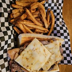 J&M’s Bar & Grill - Ribeye sandwich with hand cut fries!